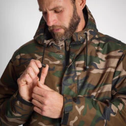 VESTE IMPERMEABLE CHAUDE 100 CAMO WOODLAND 13 VESTE IMPERMEABLE CHAUDE 100 CAMO WOODLAND -Le monde de la chasse Magasin veste impermeable chaude 100 camo woodland 3